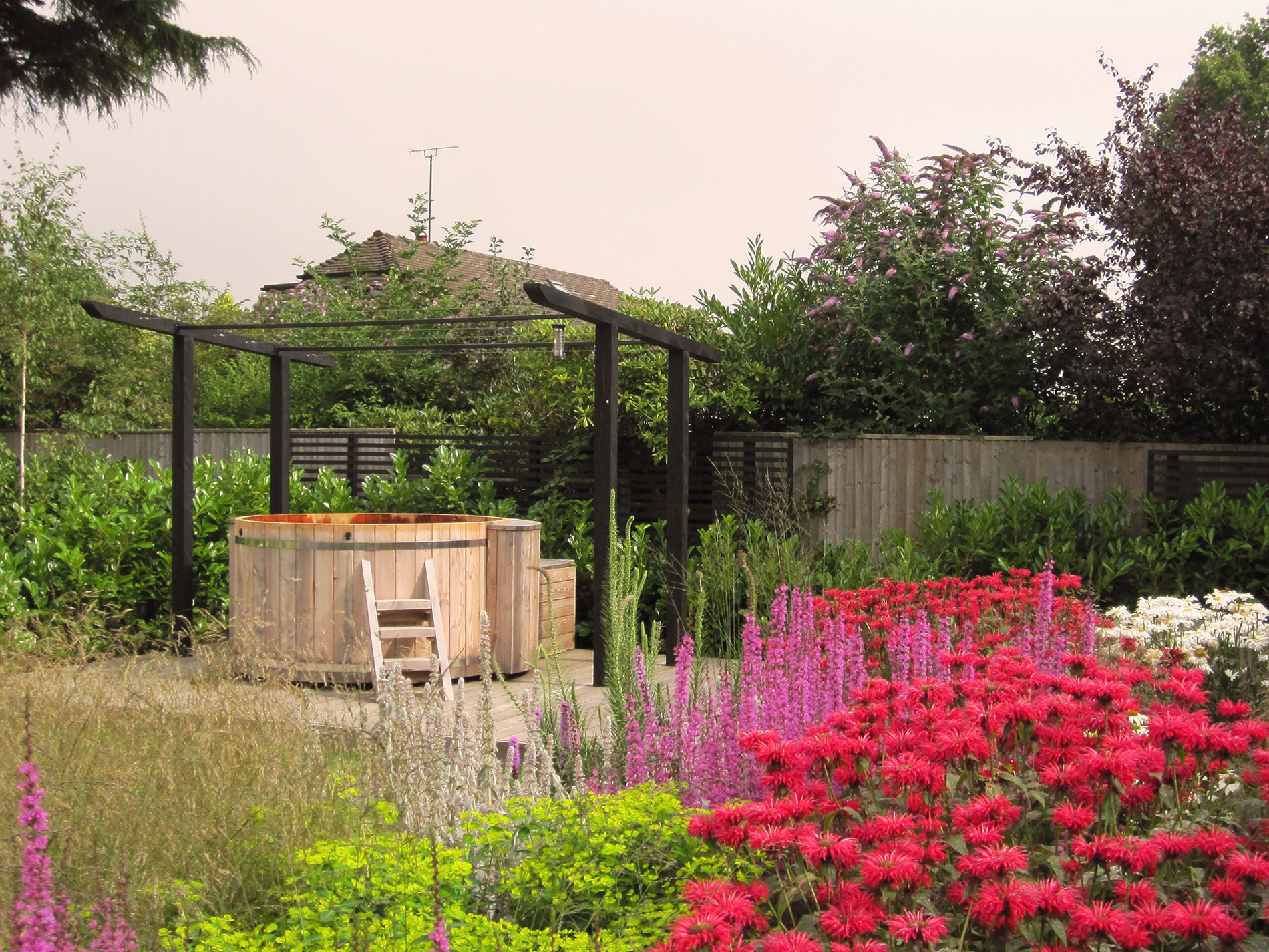 Cedar hot tub through planting, Berkhamsted